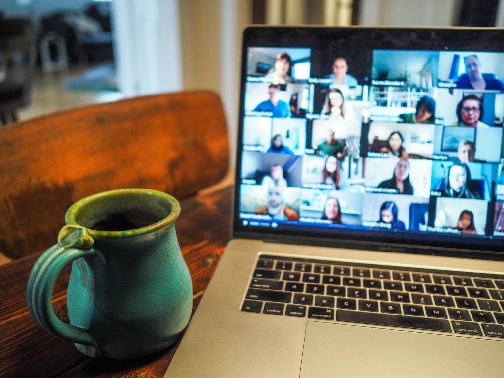 A laptop showing an online digital marketing consultancy meeting