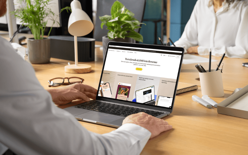 Person on laptop logging onto the Mailchimp email marketing platform